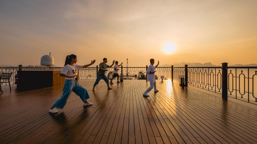 Indochine Premium Cruise: Mesmerizing sunrise at Tai Chi session