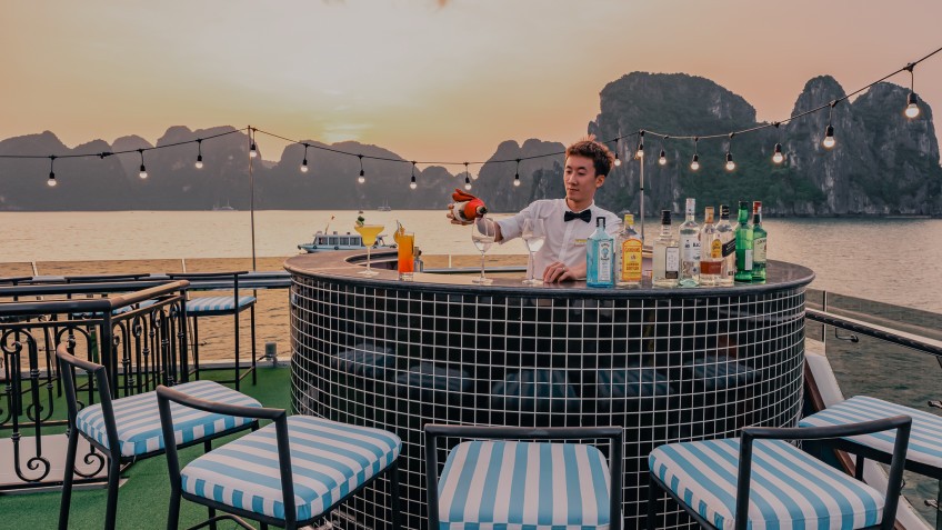Amethyst Day Cruise: Breathtaking Halong Bay view at sunset party