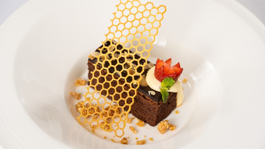 Ambassador Signature Cruise: Savor the sweet taste of a chocolate cake