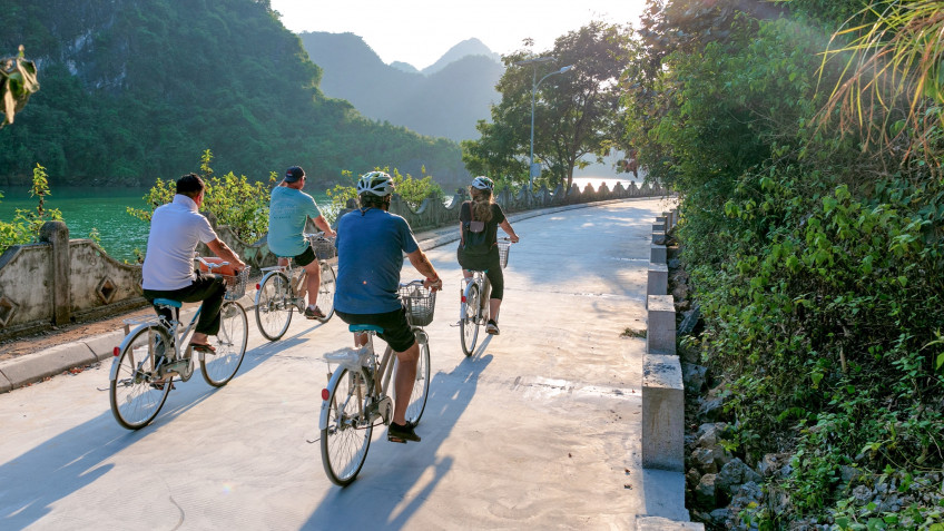 Orchid Classic Cruise: Cycling along winding village on Cat Ba Island